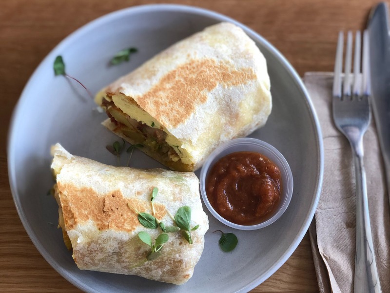 breakfast burrito with sauce