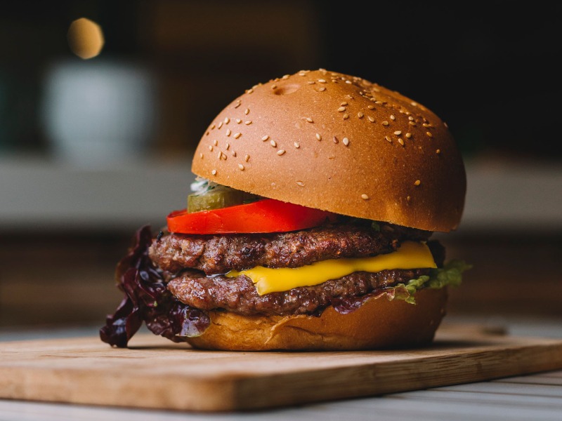 double patty cheeseburger with tomato