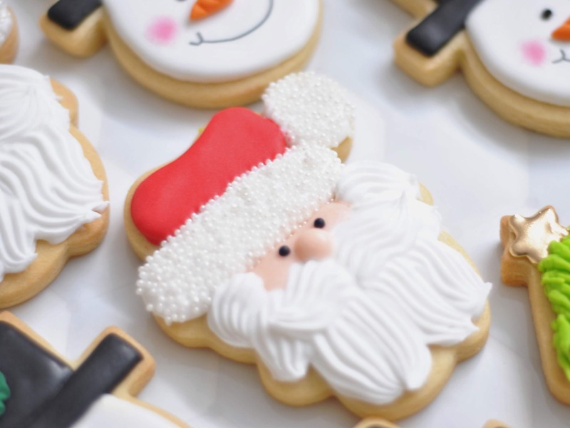 sugar cookies shaped into a santa