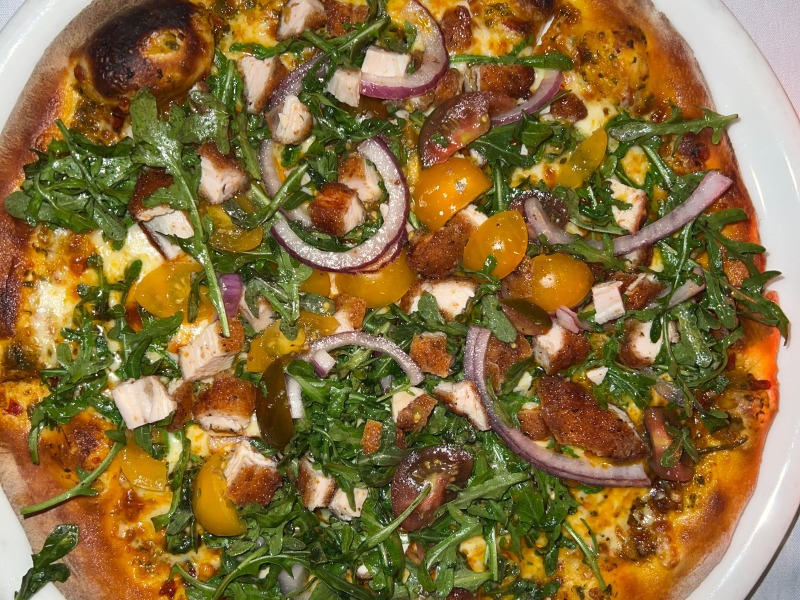 Avanzare veggie pizza with cherry tomatoes and spinach 
