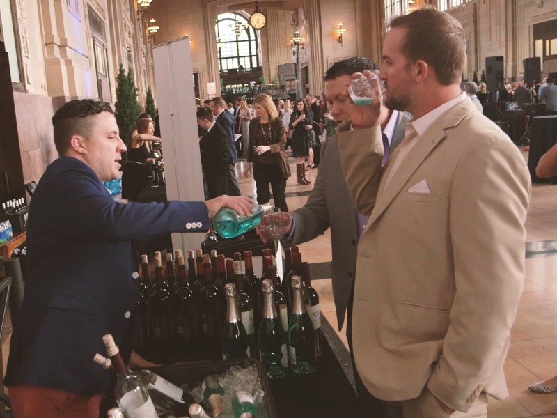 Uncorked Wine Festival tasting booths featuring 3 gentlemen