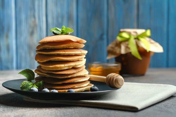 Protein Pancakes with honey and stain wood