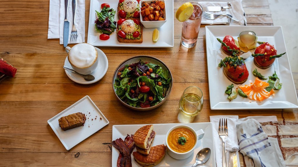 Wheat's End Cafe & Bakery table with coffee, bread, and drinks