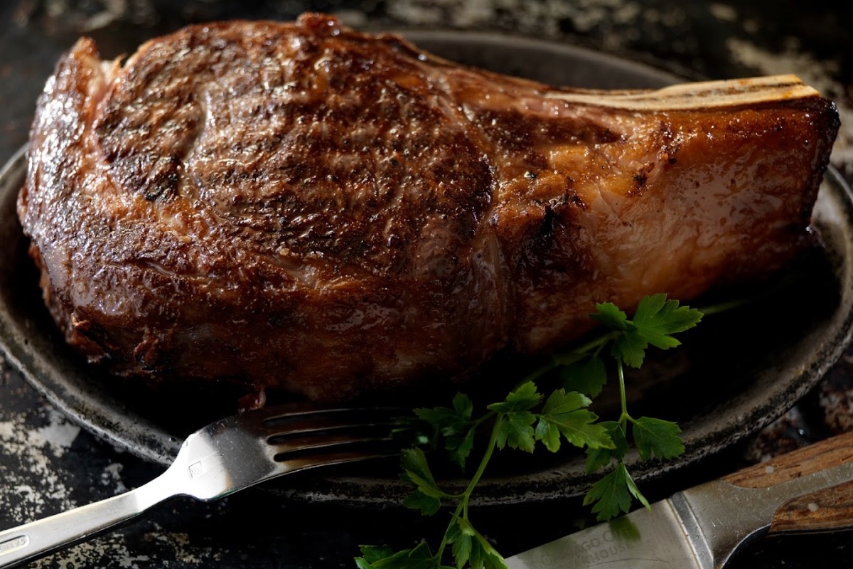 Chicago Cut Steakhouse steaks with dishes