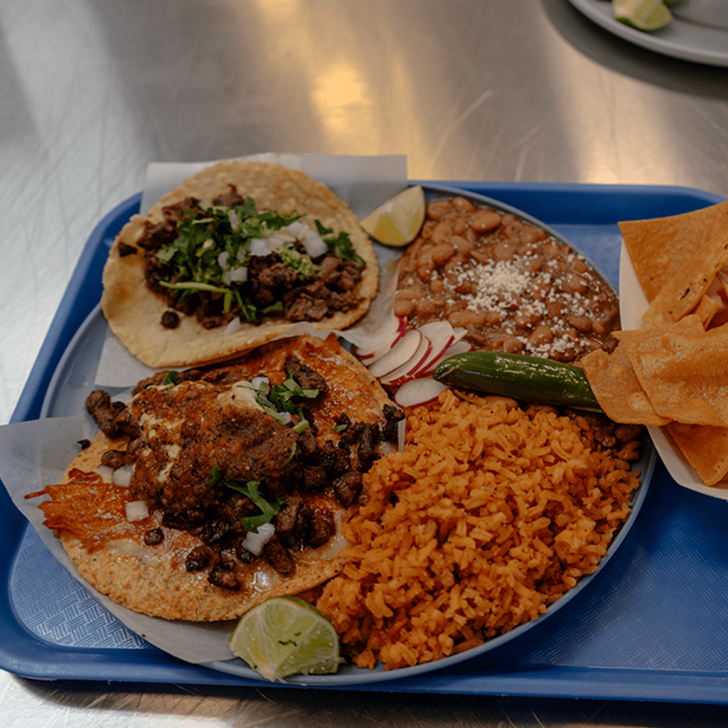 taco platter with vampiro and rice and beans